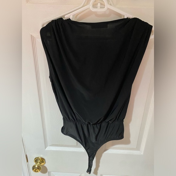 Black bodysuit. NWT never been worn. Size large - Picture 4 of 5